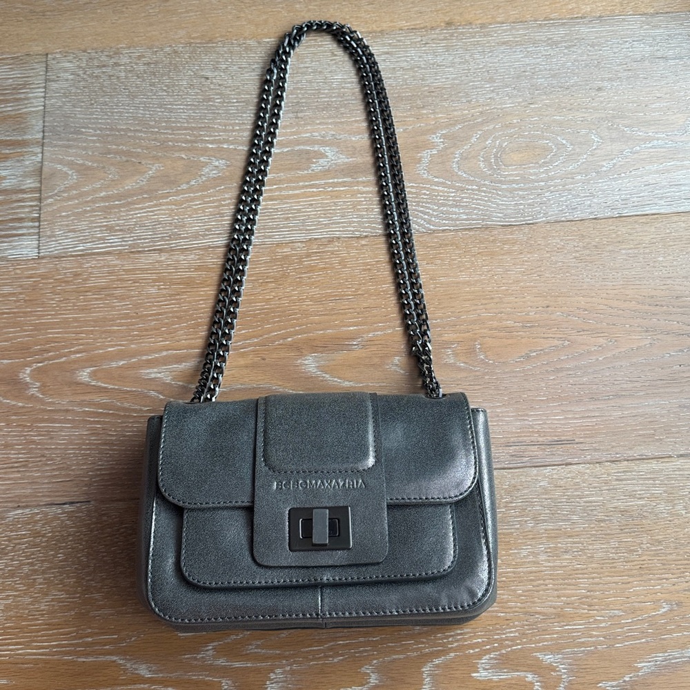 BCBGMAXAZRIA leather crossbody bag with a chain strap